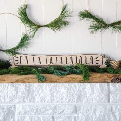 Fa La La La La... I love this! Such a simple but classy look for Christmas. 5 Minute DIY Wooden Holiday Banner Sign