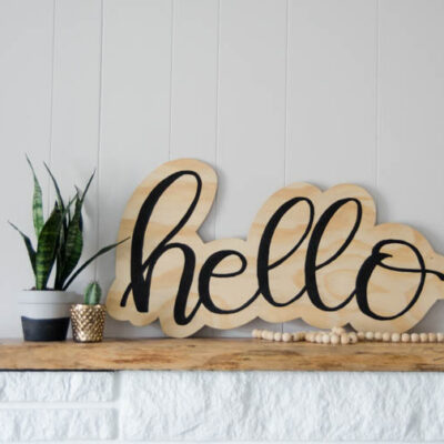 DIY plywood cutout hello sign... I LOVE this! And the video makes it look so simple