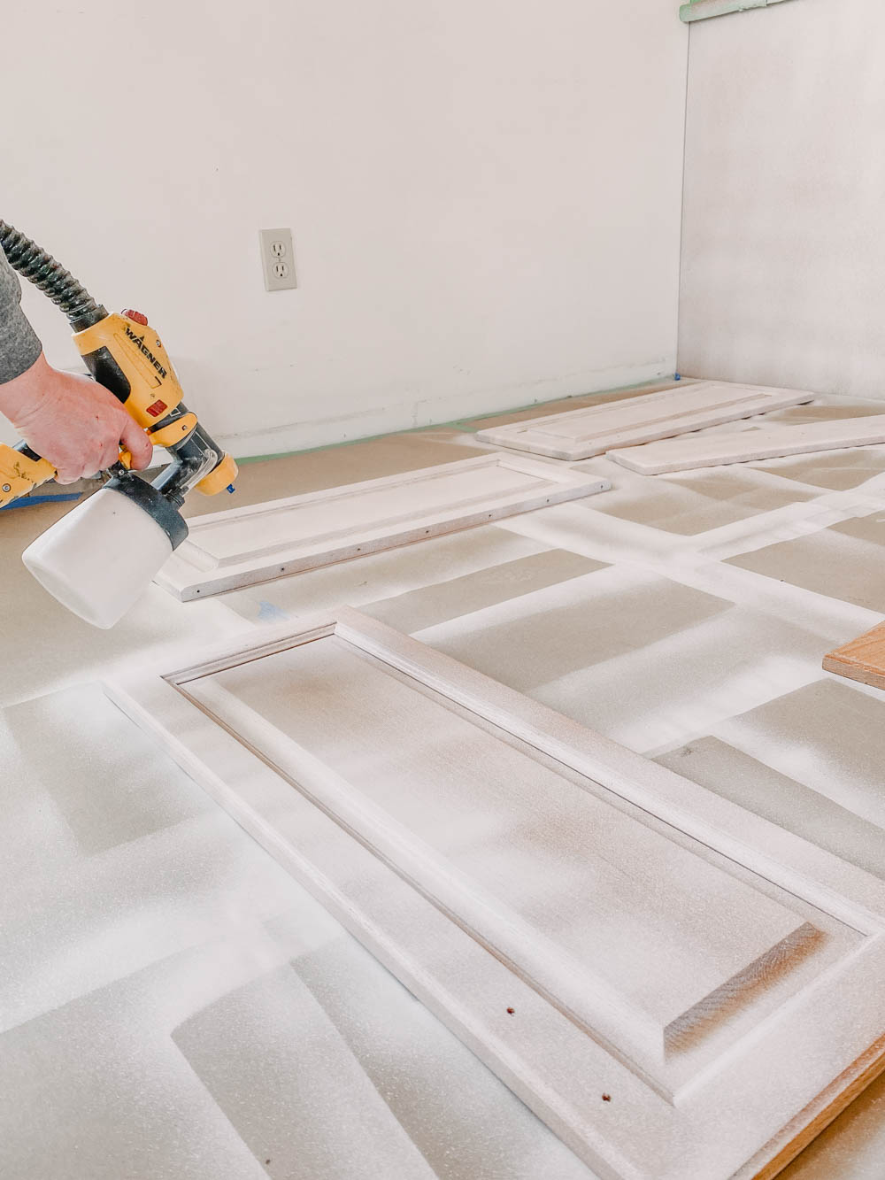 Spraying Paint for Cabinets